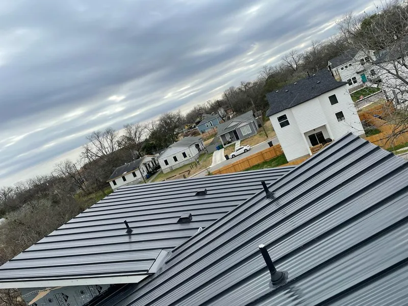 Standing seam metal roof panels with vents for Skylight Repair in Broadview Heights